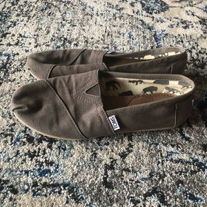 Used and worn womens Toms flats, size 8.5